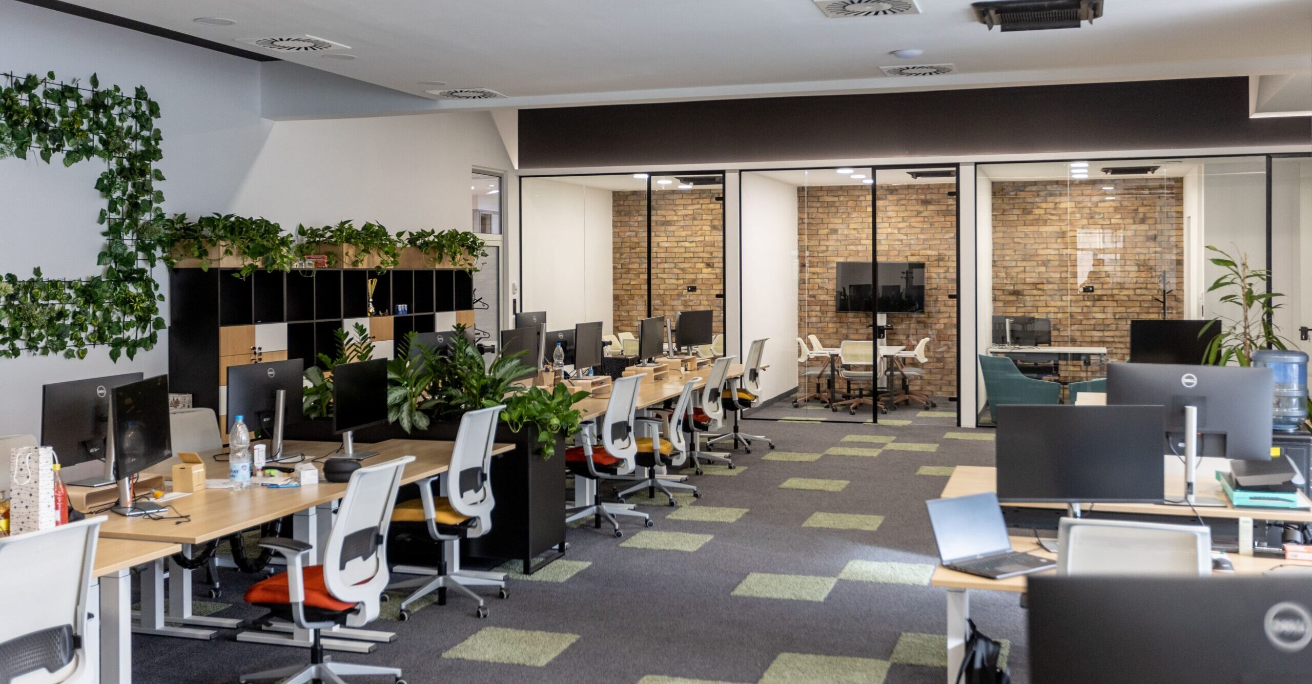 AJS Ventures hero image showing enterprise solution office setup